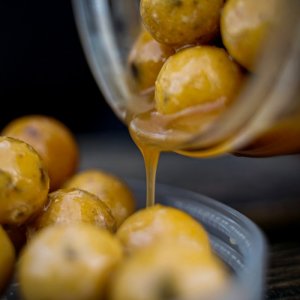 Dipované boilies Munch Baits Cream Seed 200ml